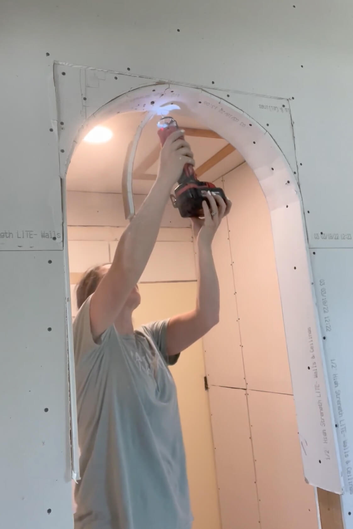 Adding drywall to an arched doorway. 